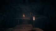 A rickety bridge within the cave