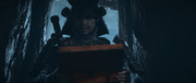 Yoshihiro looking at the box's content