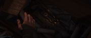 Naoe inspecting the Hidden Blade passed down to her