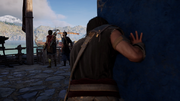 An individual eavesdropping on Kassandra and Natakas from behind
