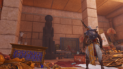 Bayek finding a statue of Amun-Ra