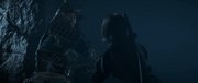 Yoshihiro strikes Naoe with his kanabo