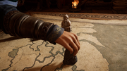 A raven figurine placed over the map of Lincolnshire