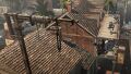 Aveline using her whip to swing from a merchandise lift.