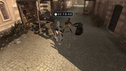 Altaïr shoving a guard towards the merchant stand