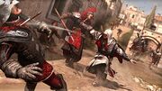 Ezio using a short blade and throwing knife.