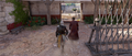 Bayek following the Lanista to the training grounds
