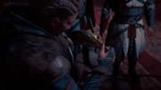 Eivor receiving her Hidden Blade