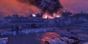 Charlestown at night, with conflict brewing in the distance