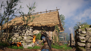 Eivor torching the huts of Crawleah