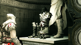 Ezio looks at Altaïr's statue and armor.