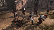 Ezio fighting Il Carnefice's guards