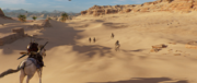 Bayek witnessing Merkes being pursued by bandits