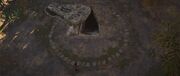 The rock revealing an entrance below