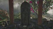 A Jizō statue at a roadside shrine