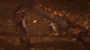 Deimos trapped underneath a burning tree