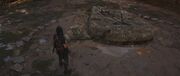 Naoe finds rock formations engraved with symbols from her parent's former group