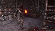 Kassandra about to set the war supplies at the fort on fire