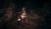 The statue within the cave