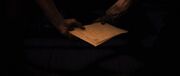 The Templar documents retrieved in their hands