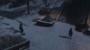 Naoe finding a bloody scene near the steps to the temple
