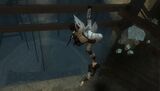 Altaïr helping Maria out of the Archive as it collapses.