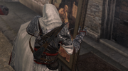 Ezio marking a painting