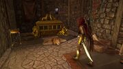 Kassandra discovering a chest within the fort