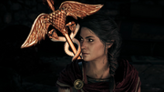 Kassandra looking at her Staff