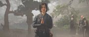 Naoe praying at the stream