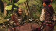 Aveline speaking with the houngan