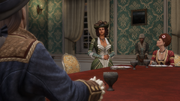 Philippe speaking with Aveline at dinner