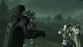 Uncle Mario throws Ezio a sword to fight back.