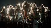 Bayek, flanked by apparitions of various Egyptian Hidden Ones