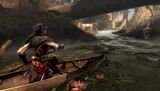 Aveline traversing the waters of the Bayou using a canoe.