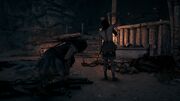 Kassandra sneaking up on a Follower of Ares priest
