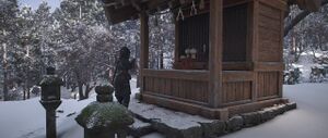 ACSH Naoe praying at Aekuni Shrine.jpg