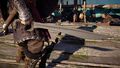 Eivor wielding the Hero's Sword in Assassin's Creed Valhalla