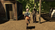 Aveline speaking with one of the slaves