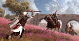 Ezio throwing a spear at a guard on horseback.