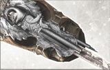 A close-up of the Hidden Gun on Ezio's bracer